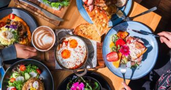 A tabletop view showing brunch food.