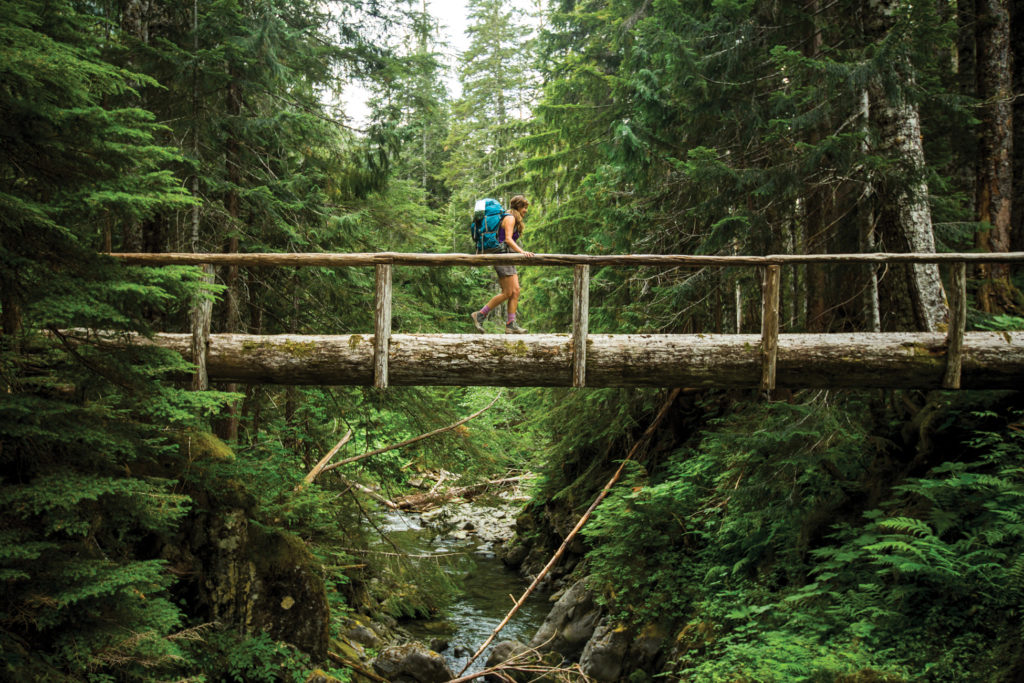 Woman hiking outdoors in Olympic National Park