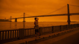 Bay Bridge In Dark Orange Haze