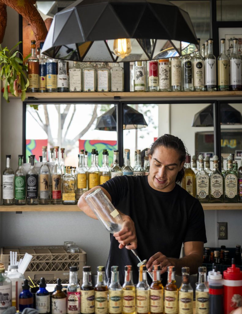 Bartender Adrian Galindo makes cocktail at Bacanora