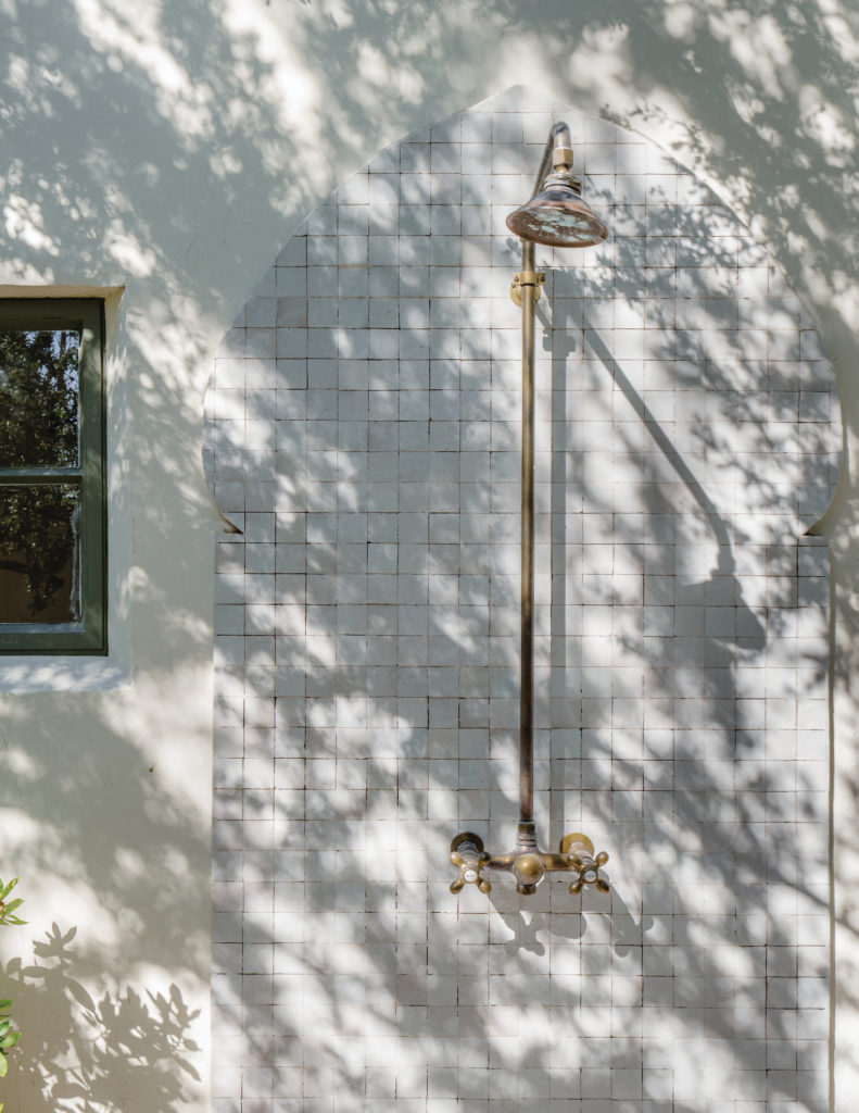 Outdoor shower with white tile in Arizona