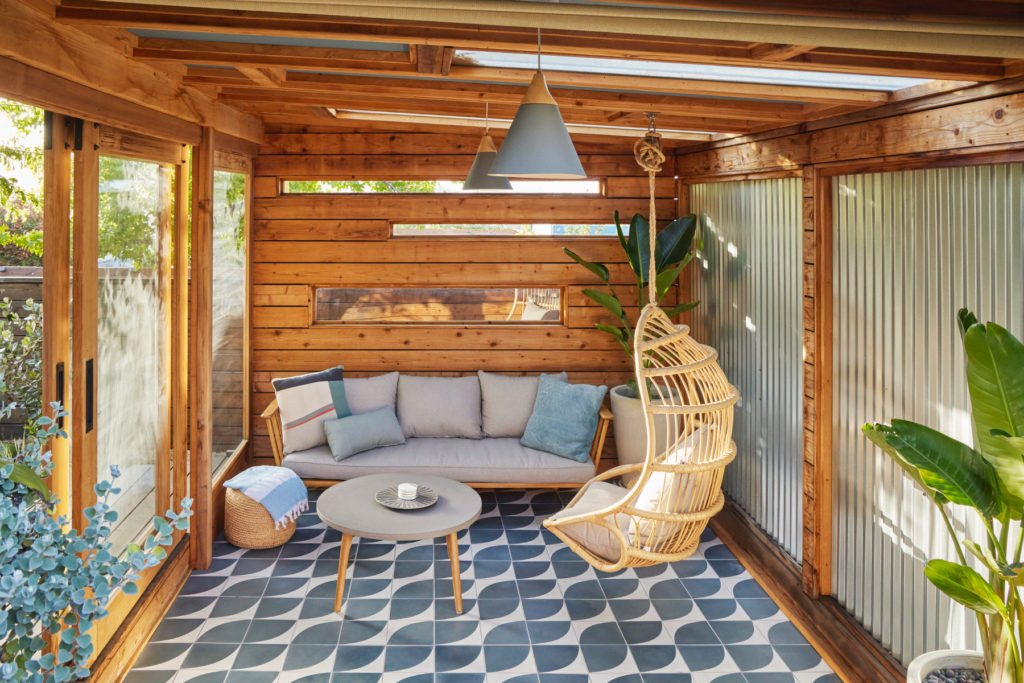 A Cabana that opens out to the hot tub makes full use of a San Francisco Garden