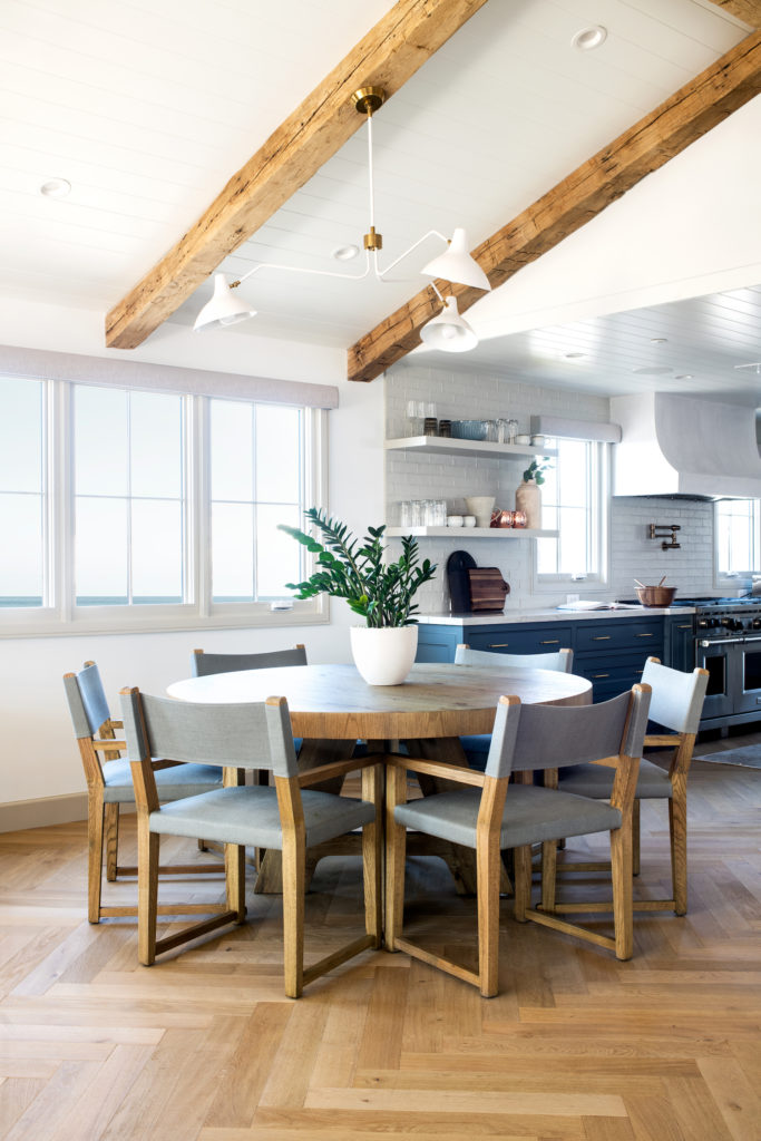 Manhattan Beach home tour by HMS Interiors kitchen with vaulted beams.