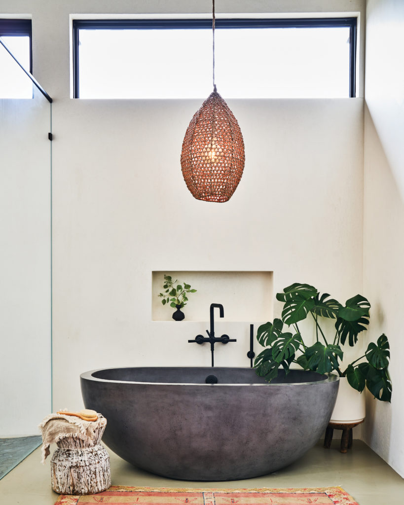 Newport Beach home bathroom bath tub with plants