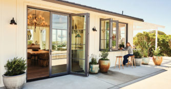 Indoor/outdoor living with bifold doors and passthrough window