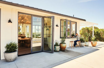 Indoor/outdoor living with bifold doors and passthrough window