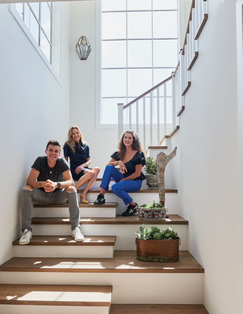 Family portrait on staircase in Malibu home