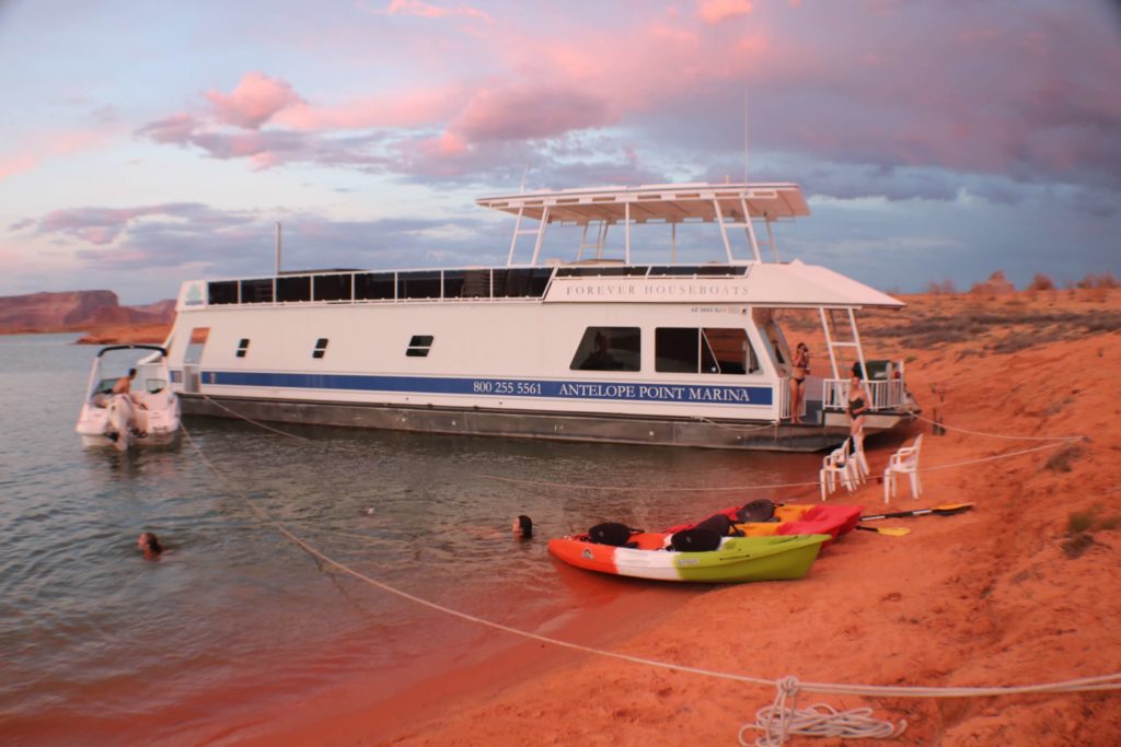 houseboat sunset red sand kayaks