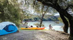 Kayaks and tent at Lake Sonoma, California