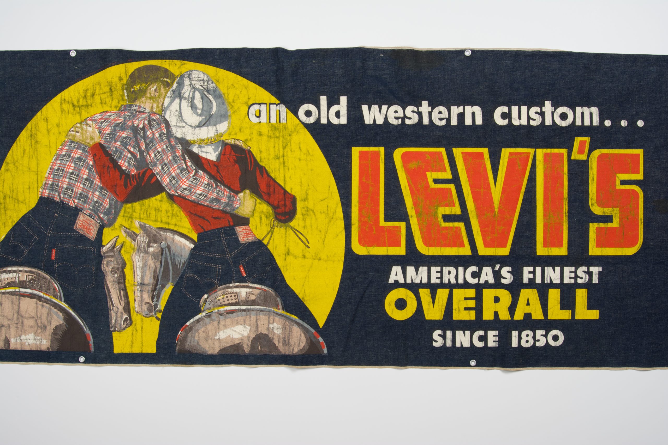 Old Levi's advertisement says, "an old western custom...Levi's America's Finest Overall since 1850"