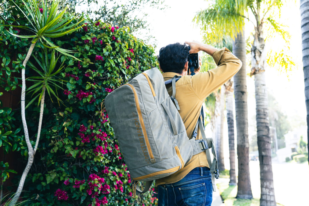 Photographer carries Mission Rover backpack