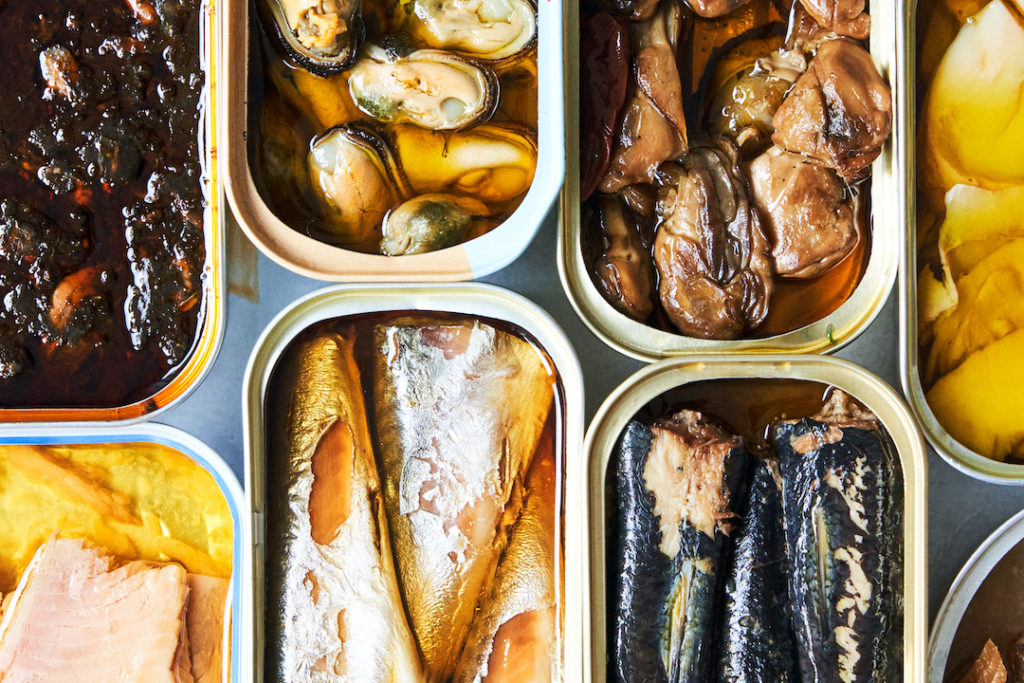 A variety of tinned fish for your sea-cuterie board