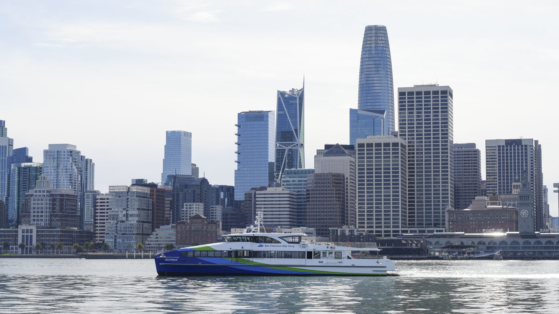 a-san-francisco-bay-ferry-vessel-in-front-of-the-san-francisco-skyline