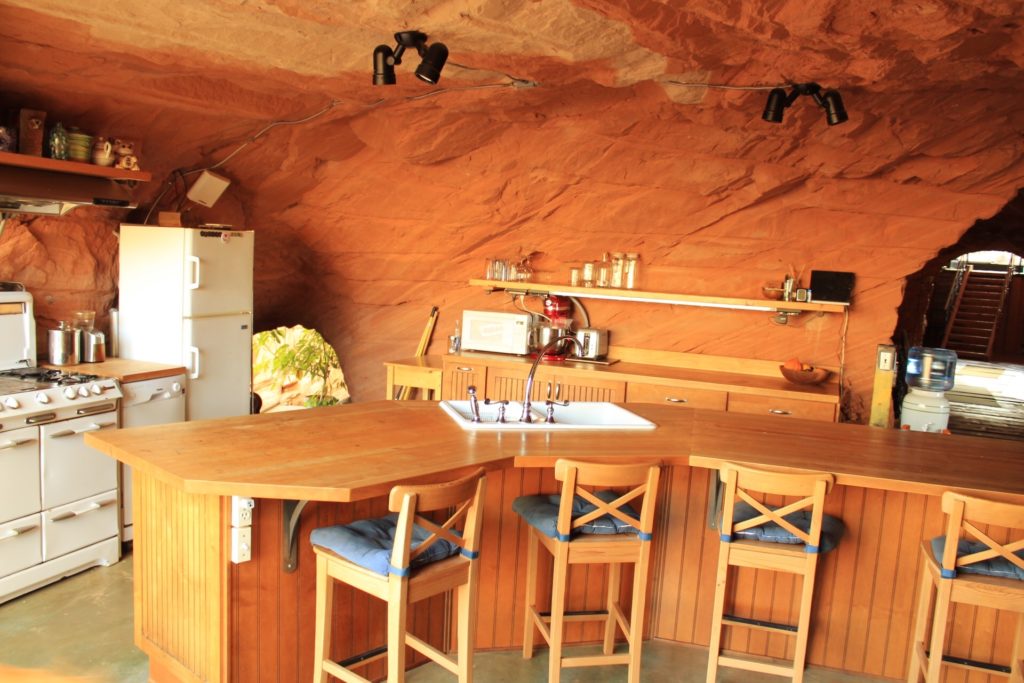 kitchen bar with cave walls surrounding