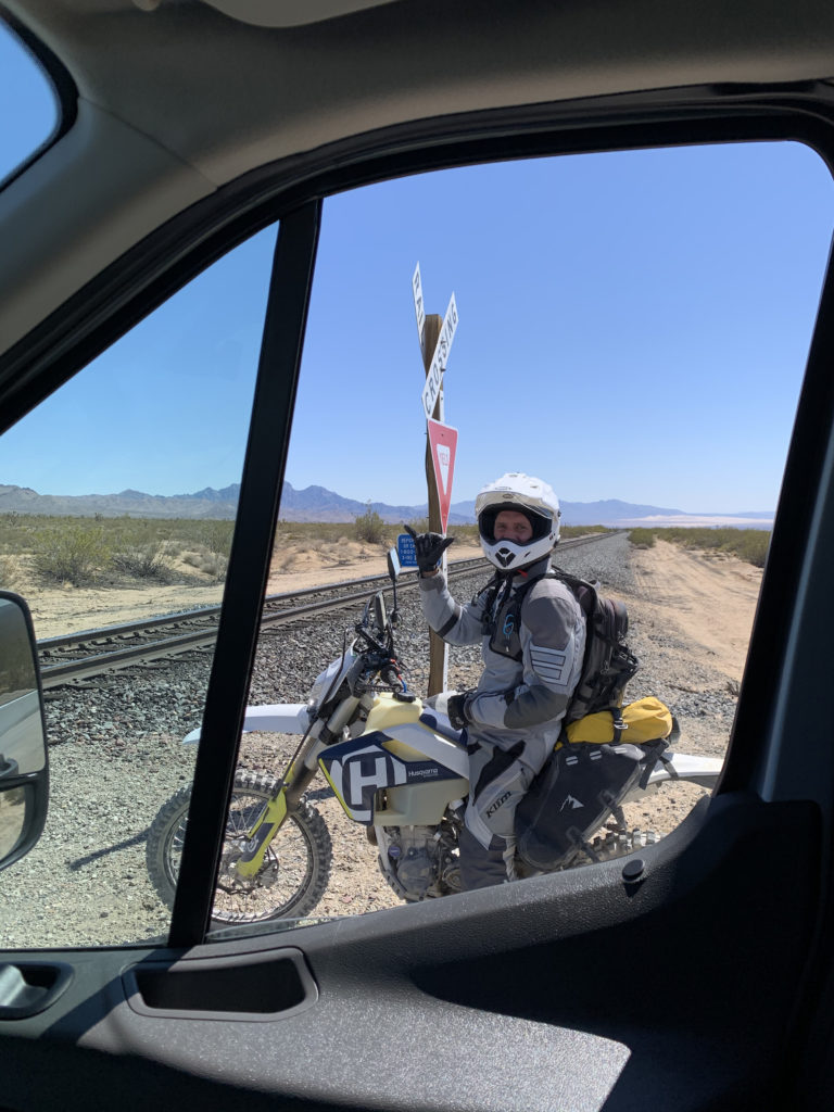 man on motorbike on Cedar Canyon Road Mojave National Preserve