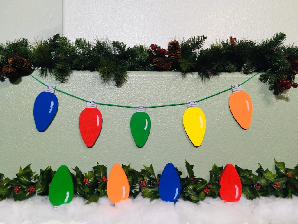 string of wooden colorful christmas lights
