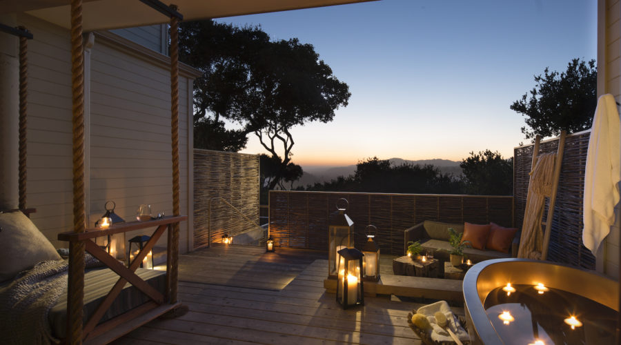 The outdoor tub on the balcony of the Carmel Valley Ranch in California at dusk
