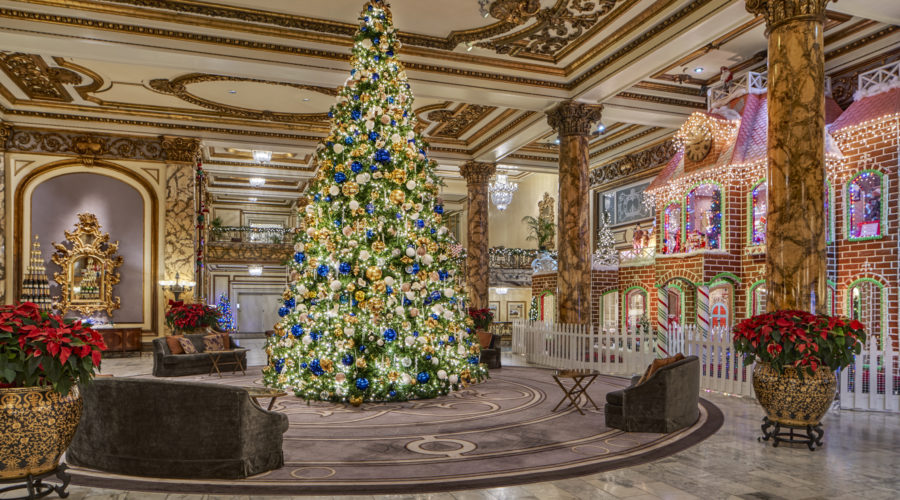 Christmas tree and gingerbread house in lobby at the Fairmont San Francisco