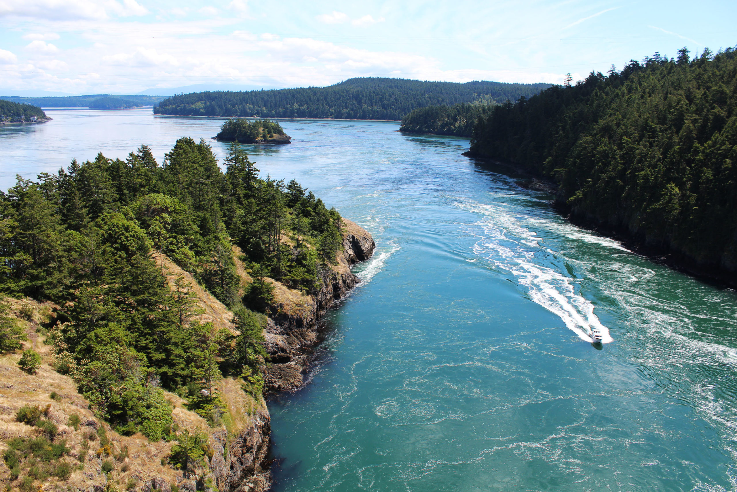 Boat driving through Deception Pass