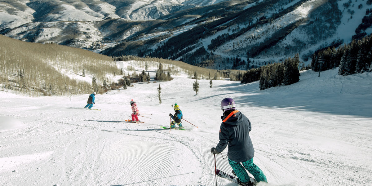 Kids skiing down a mountain at Beaver Creek Ski Resort