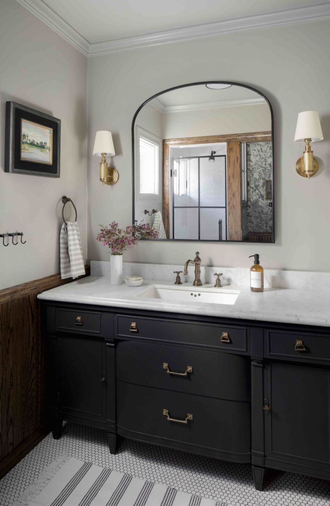 single sink vanity primary bathroom Corine Maggio