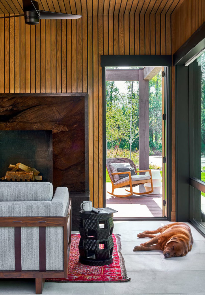 Park City sitting room with wood panels, dog napping