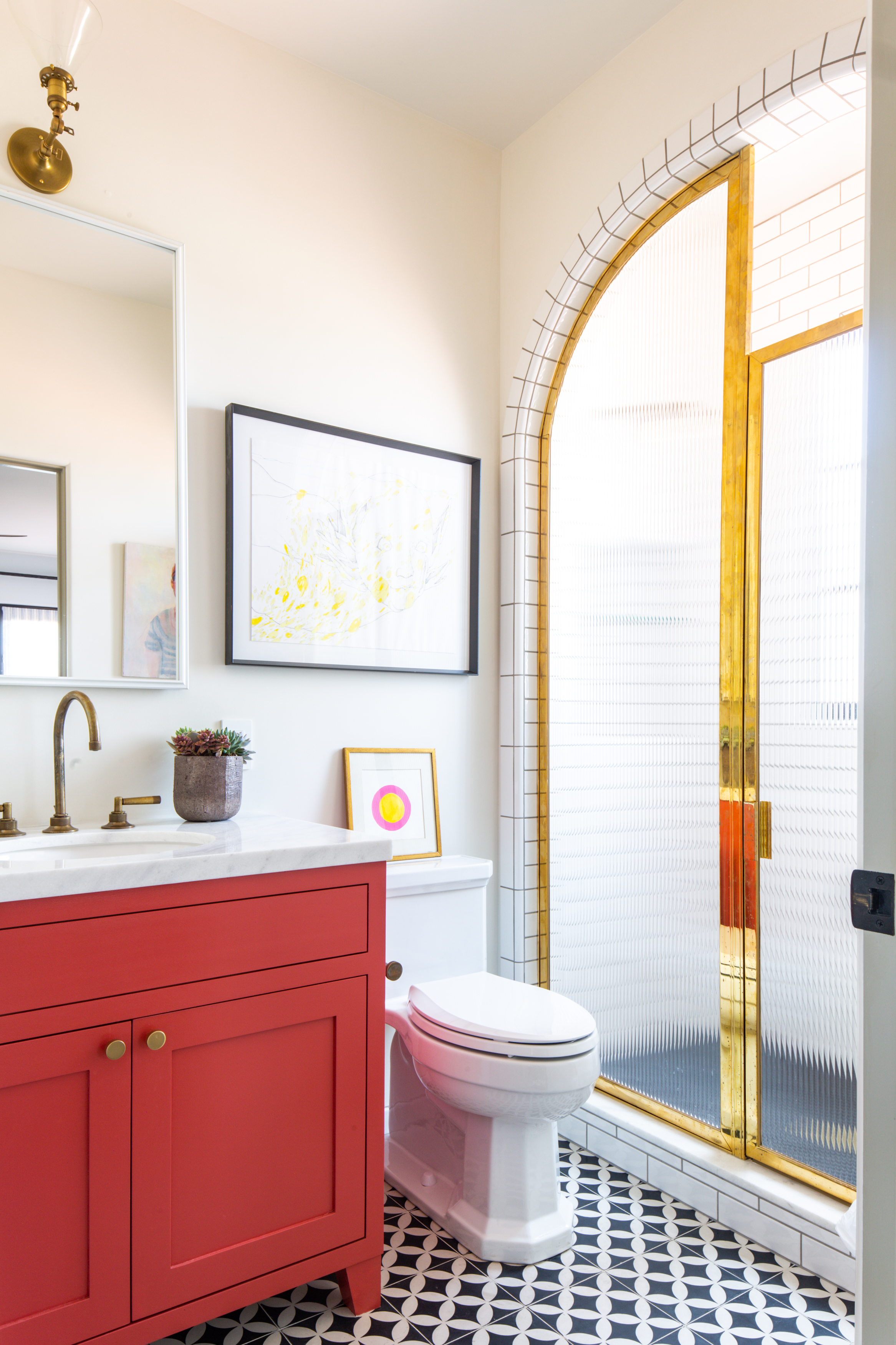 family bathroom red cabinets tile floor