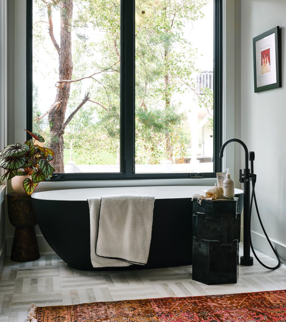 Bathroom with black bath tub in Park City home