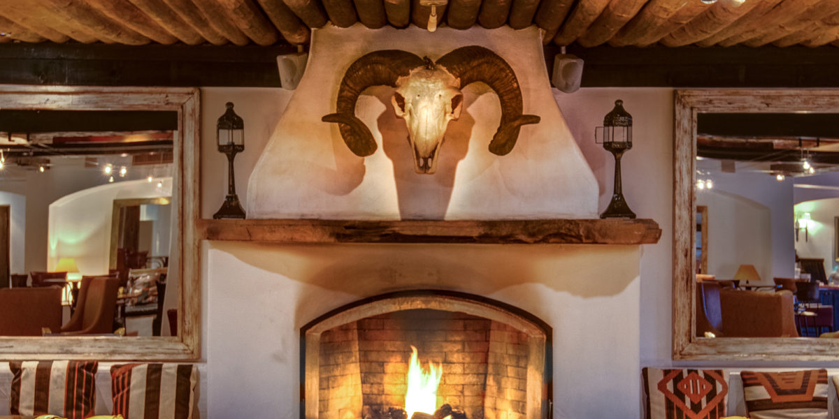 Fireplace and Cow Skull at Inn at Loretto