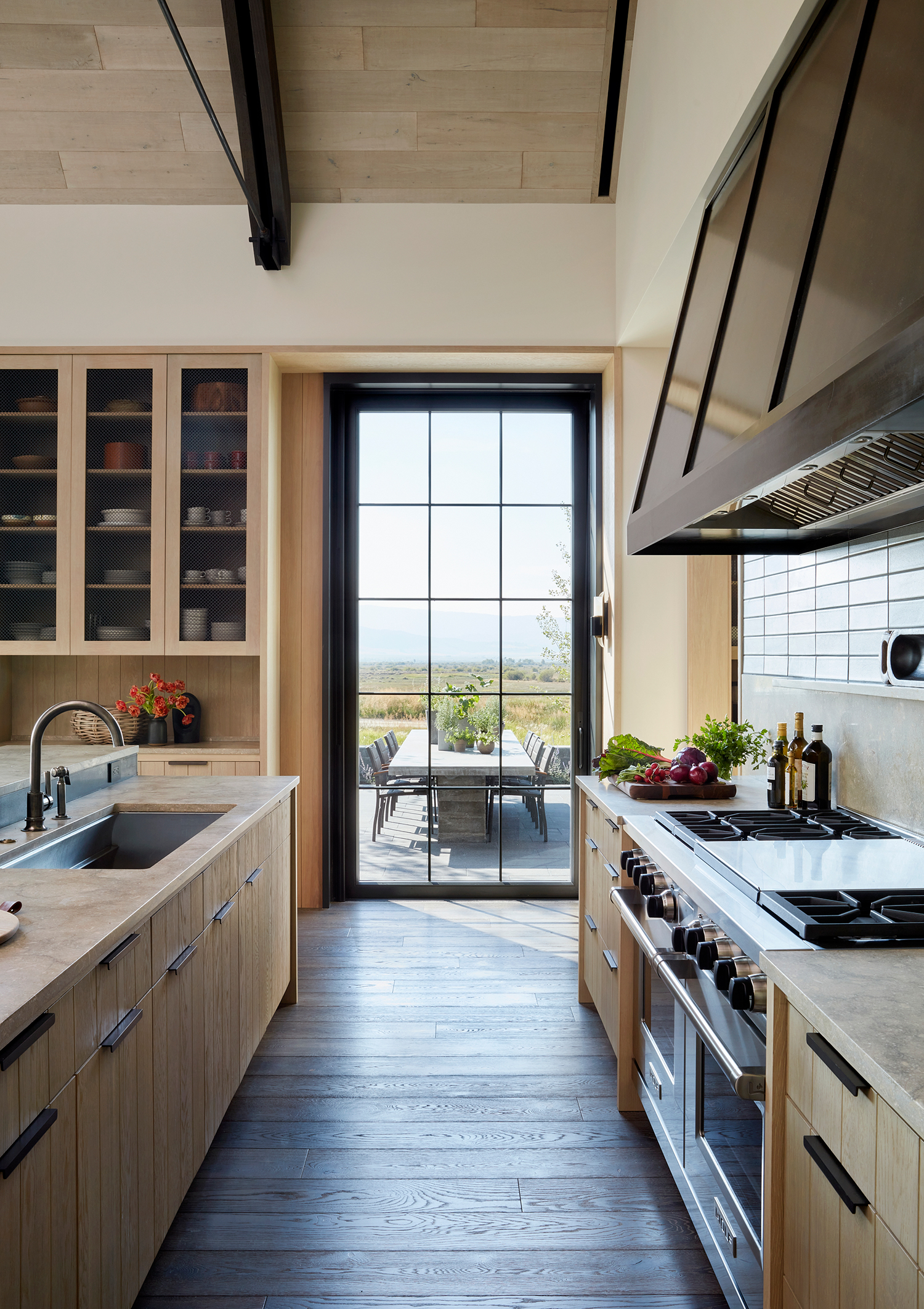 Kitchen Door in Driggs Idaho House by Robbins Architecture