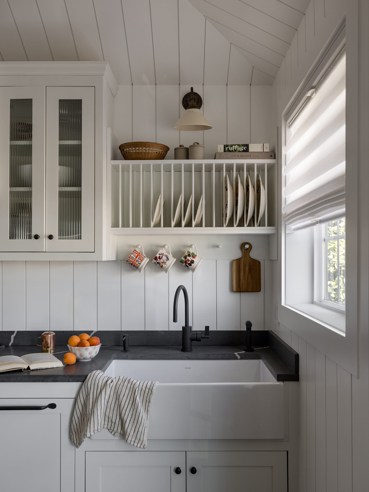 Kitchen Sink in Vashon Island Cottage by White Space Design Group