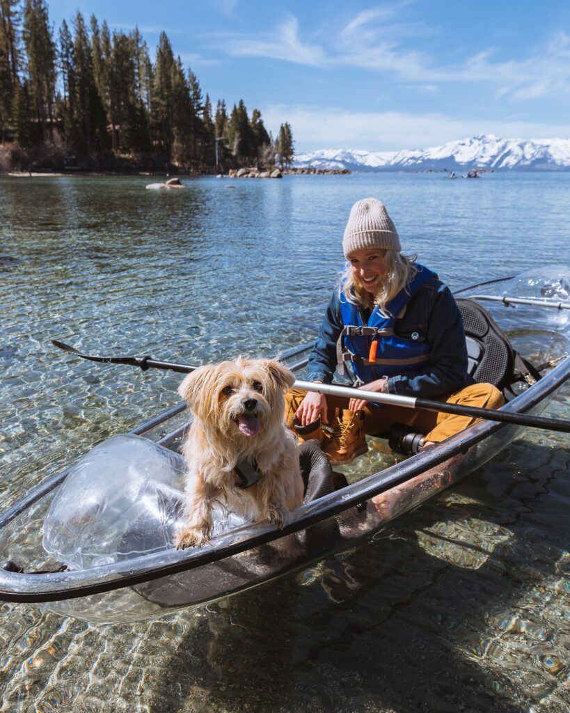 Woman and Dog in a Clear Kayak