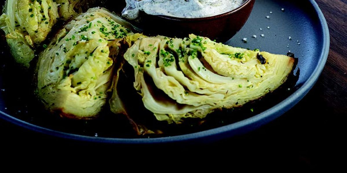 Cabbage Baked in Embers with Yogurt, Sumac, and Lemon Zest