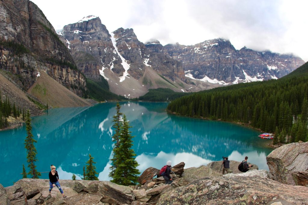 Tourists around Moraine Lake in Banff National Park, one of many parks affected by overtourism
