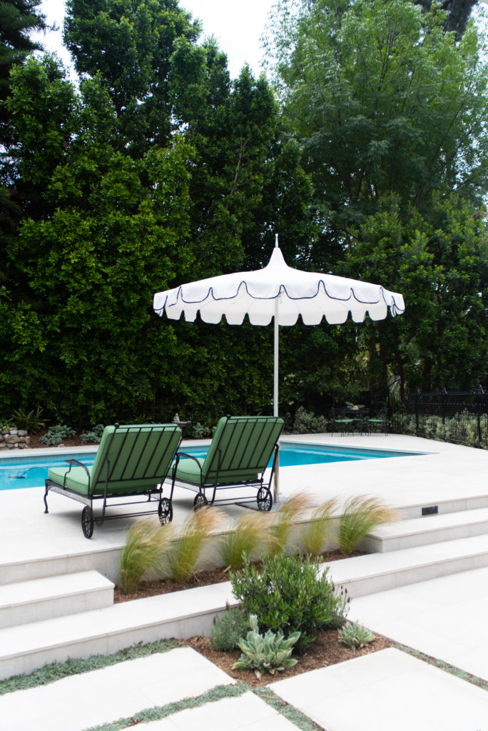 vintage lounge chairs pool deck Serena and lily umbrella