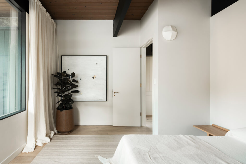 Primary Bedroom in Buff & Hensman House by Stephani Gan Mejia