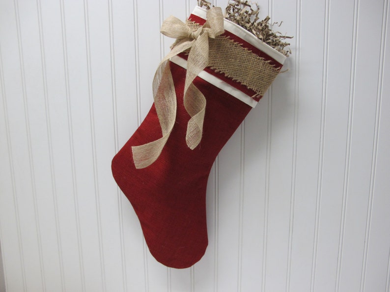 red stocking with burlap stripe sheer ribbon bow and stuffing