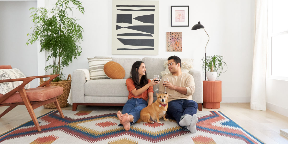 Ruggable washable rug people in living room with dog