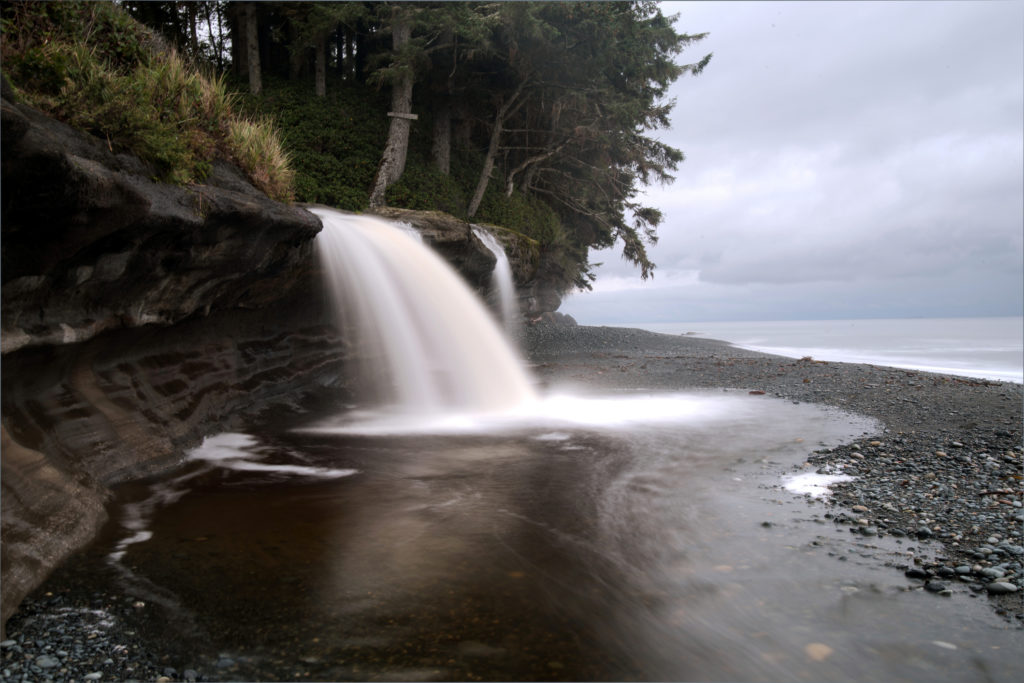 Sandcut Beach is situated between French Beach Provincial Park and Jordan River. Access to the beach is clear with a gravel parking lot and it is only a 10 minute hike from the parking area along a rugged wooded trail leads to a stone and pebble beach with sandstone and waterfalls.