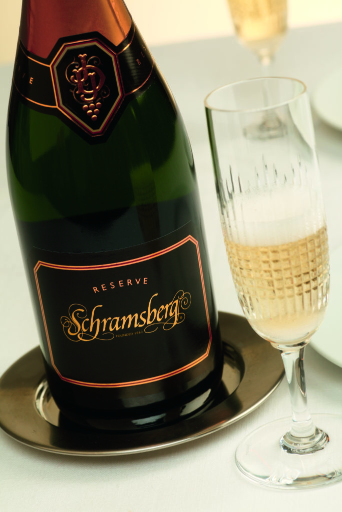 schramsberg reserve bottle on plate with champagne flute