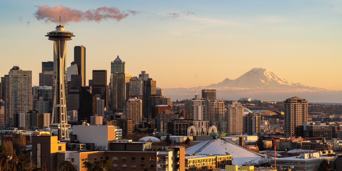 Seattle skyline featuring the Space Needle and Mt. Rainier