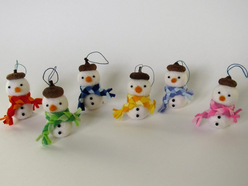 snowmen with acorn and colorful scarves