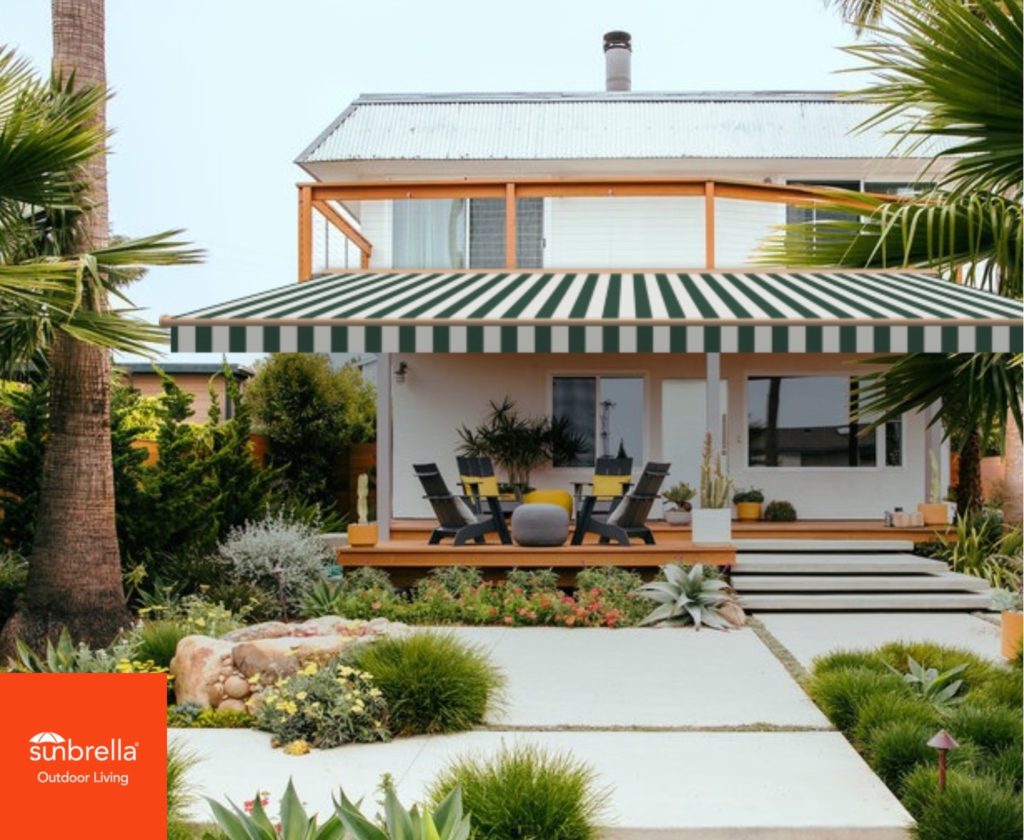 Beachy front yard shown with Beaufort Forest Green/Natural 6 Bar (4806) awning from Sunbrella using Sunbrella Shade Studio.