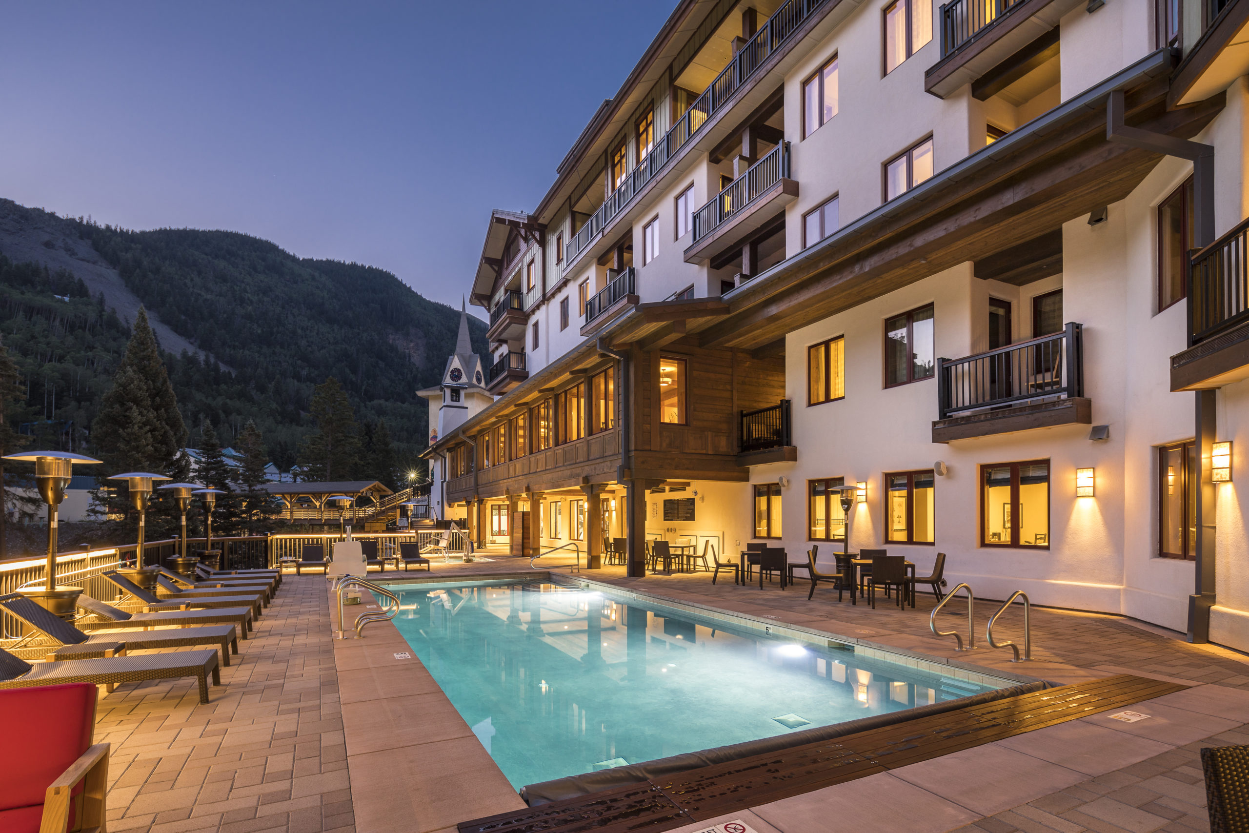 Hotel pool against the mountain backdrop.