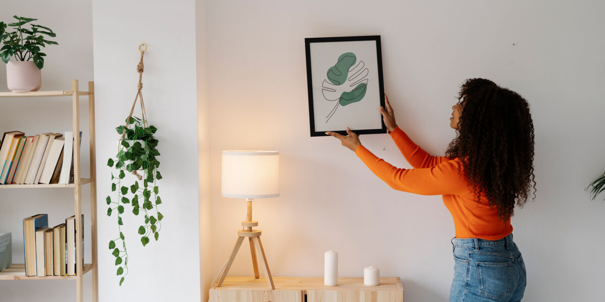 Woman Hanging Artwork