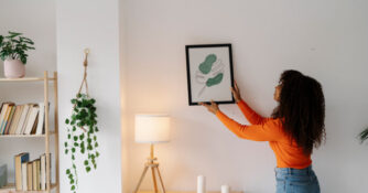 Woman Hanging Artwork