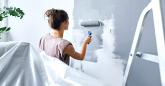 Woman Painting Wall