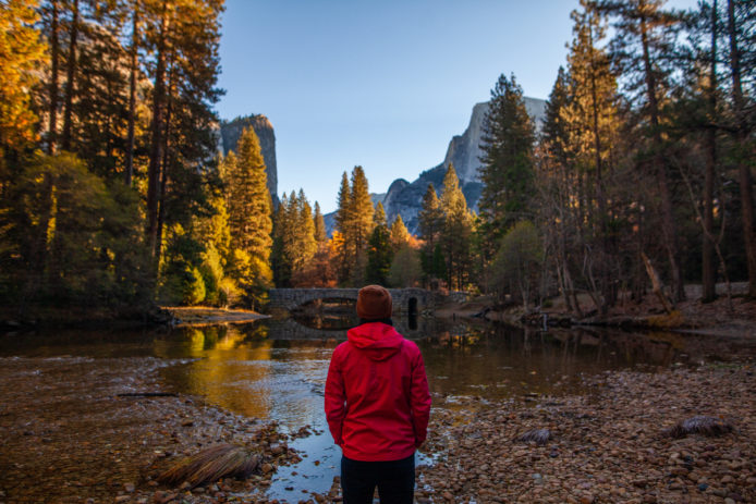 Hiker taking in the fall color in Yosemite National Park
